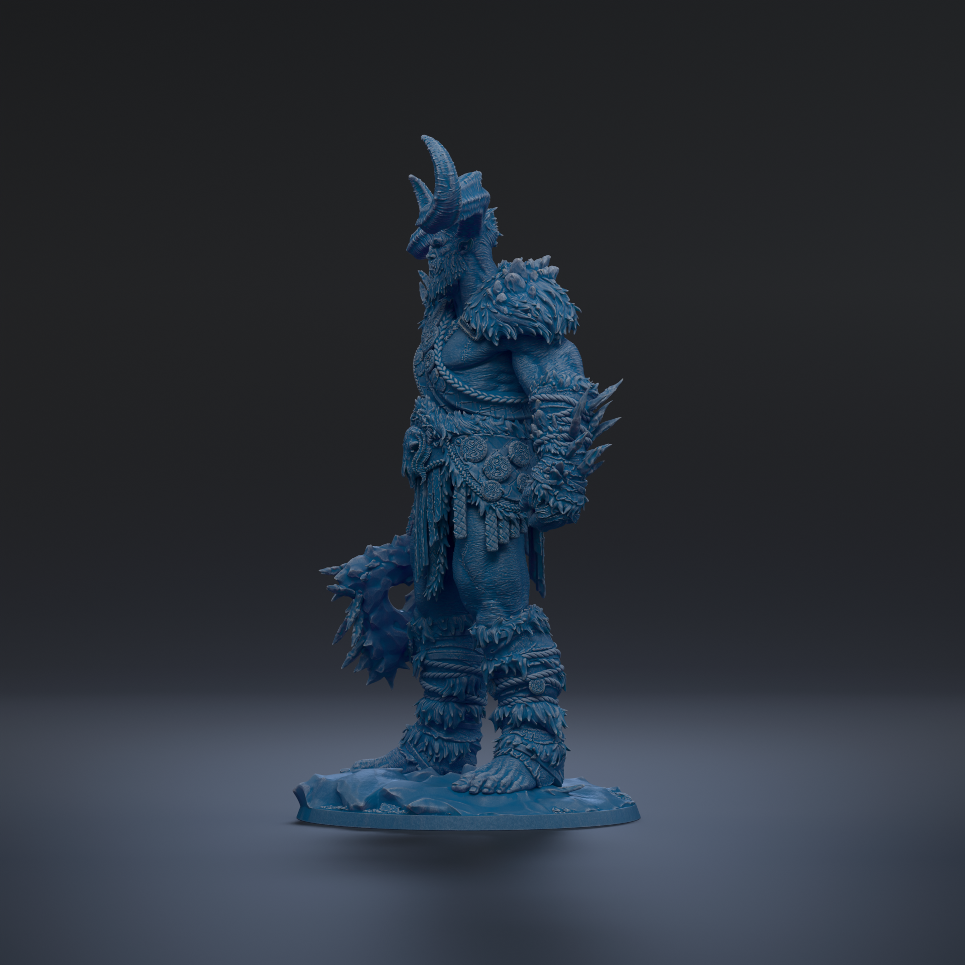 A blue, 3D-rendered statue of a warrior figure with a fierce expression and ornate armor, standing on a rock formation against a dark background.