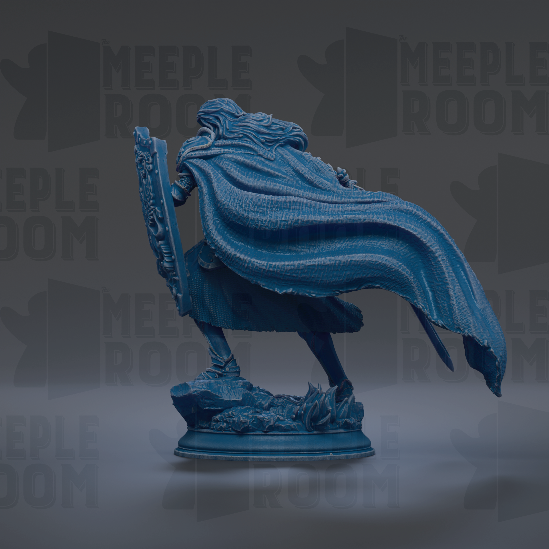 A blue statue of a person with flowing hair and a cape, standing on a rock.