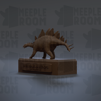 A 3D rendering of a Stegosaurus dinosaur on a pedestal, with the text "Stegosaurus Stenops" and "Lite. J.R. 3.5 cm" visible.