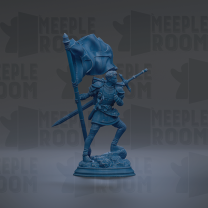 A blue statue of a knight holding a flag and sword, standing on a base.