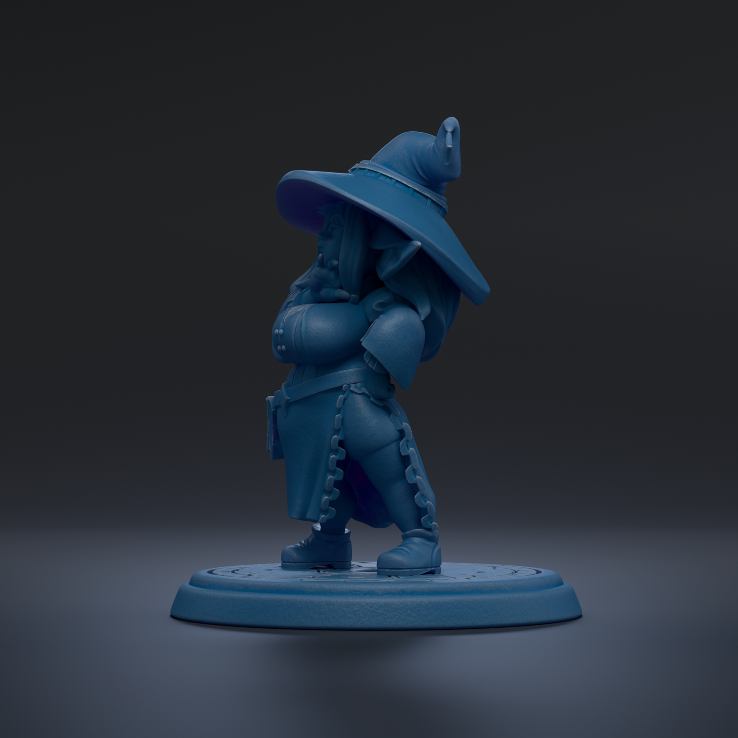 A blue figurine of a wizard or magical character standing on a platform.