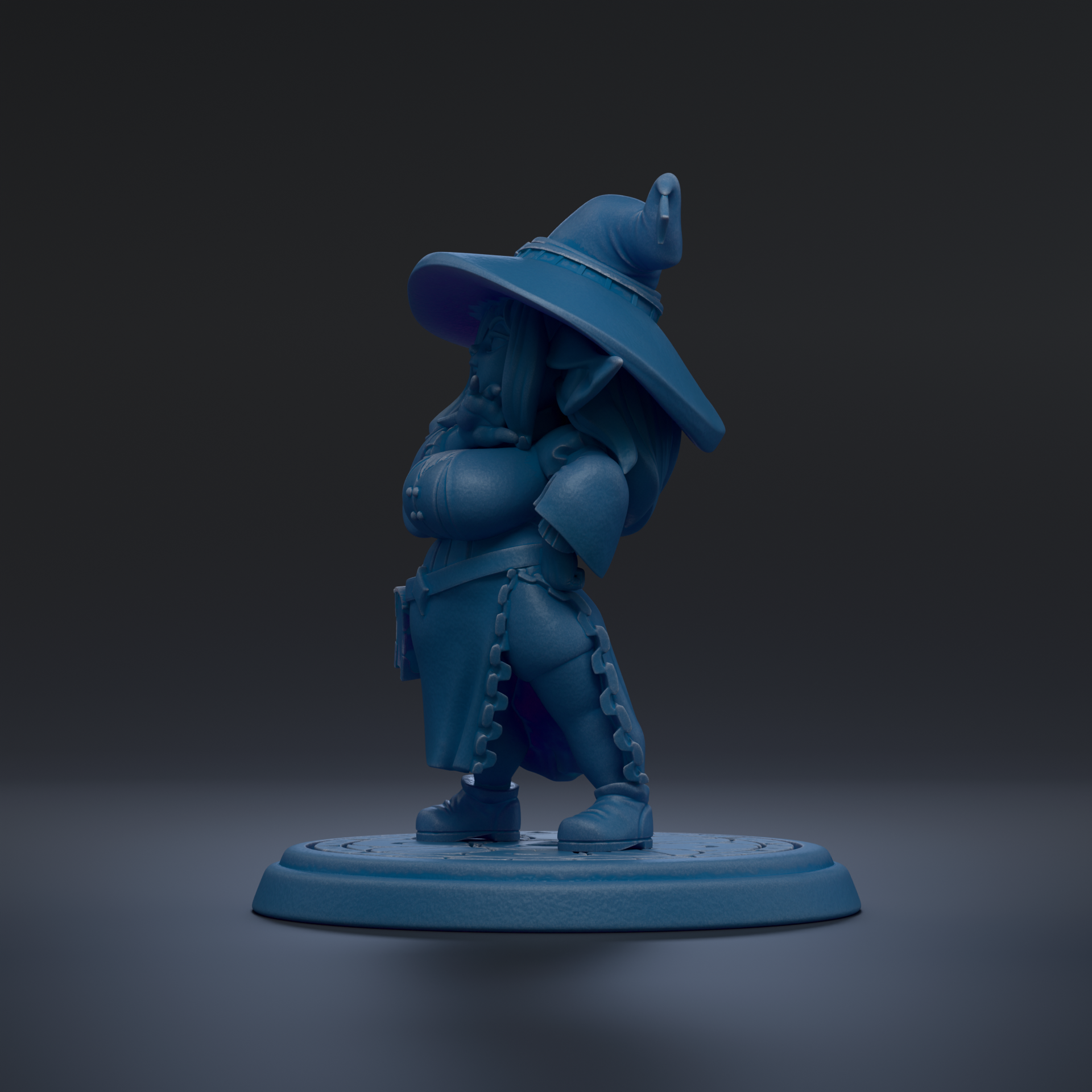 A blue figurine of a wizard or magical character standing on a platform.