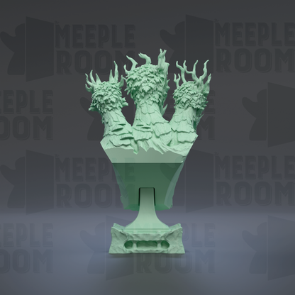 A green, sculpted statue of a tree with multiple branches and leaves, set against a dark background with repeated text.
