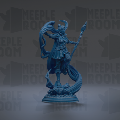 A blue figurine of a female character with flowing hair and a staff, standing on a rock and holding a staff in her right hand.