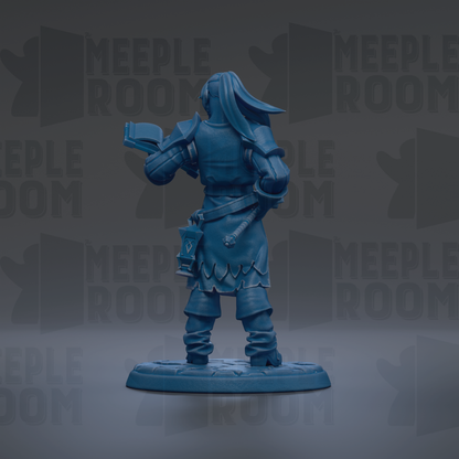 A blue figurine of a person standing in a fighting stance, holding a book in their hand.