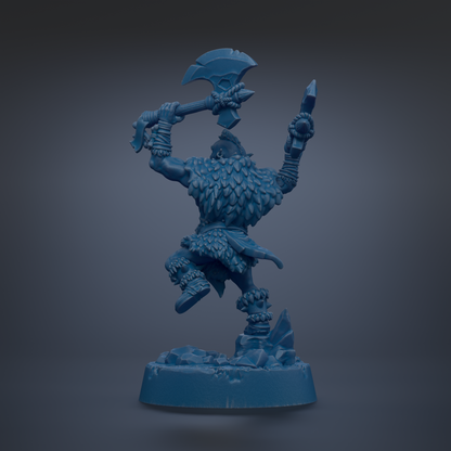 A blue figurine of a warrior-like character with a large weapon and a feathered outfit, standing on a rocky base.