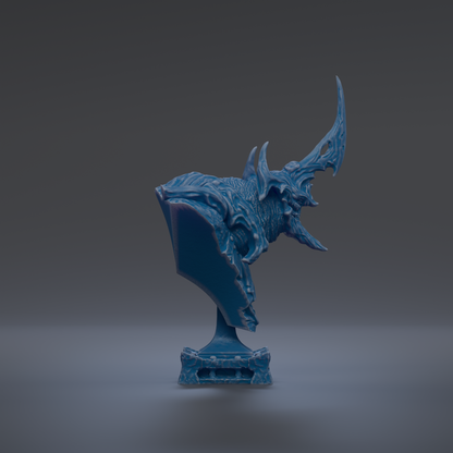 A blue, sculpted figurine of a horned creature with sharp, pointed features stands on a pedestal against a dark background.