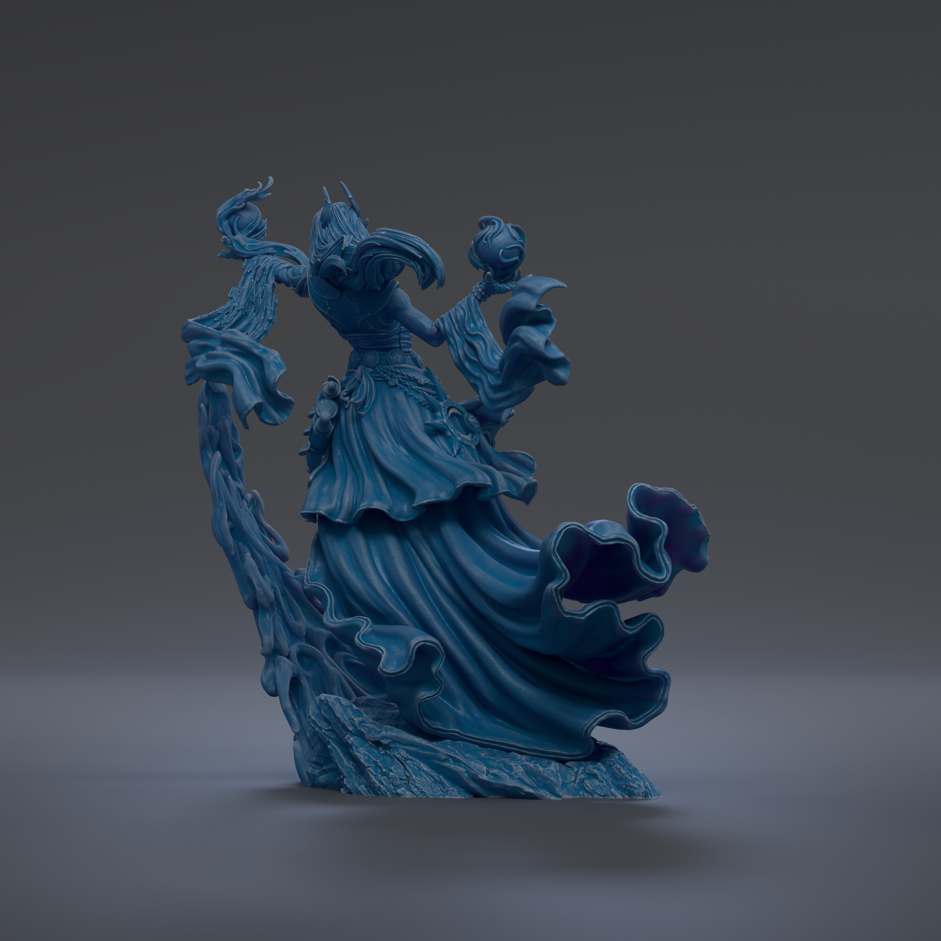 A blue, flowing statue of a figure with a long, flowing dress and a headdress, standing on a rock and holding a staff.