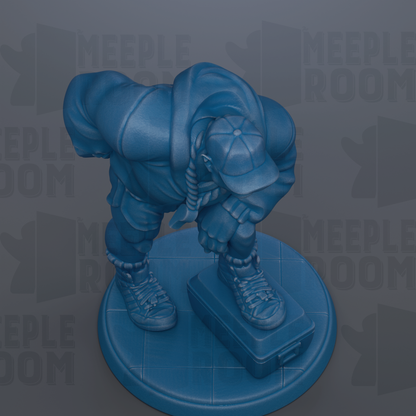 A blue statue of a person standing on a blue platform, with the text "MEEPLE ROOM" visible in the background.