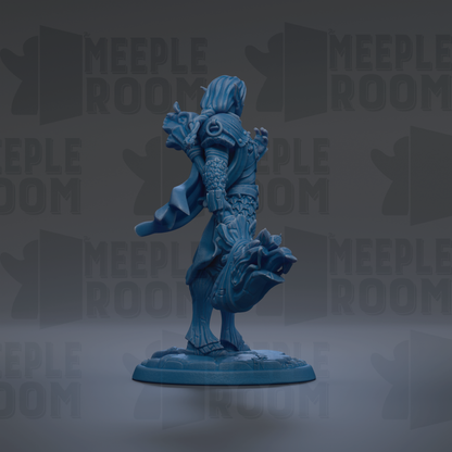 A blue figurine of a person standing on a platform, holding a dragon-like creature in their hands.