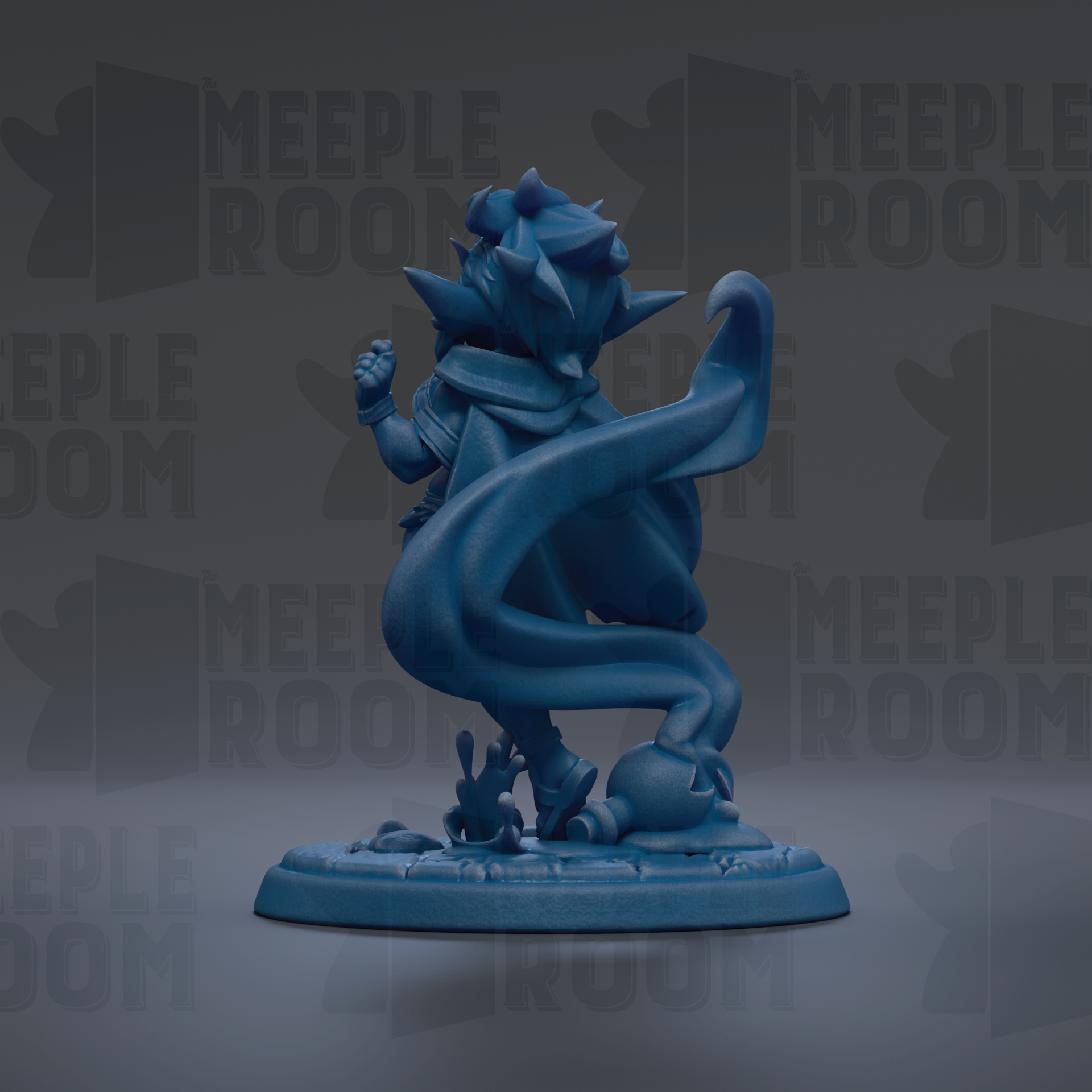 A blue figurine of a character with a flowing cape and spikes, standing on a base with a textured surface.
