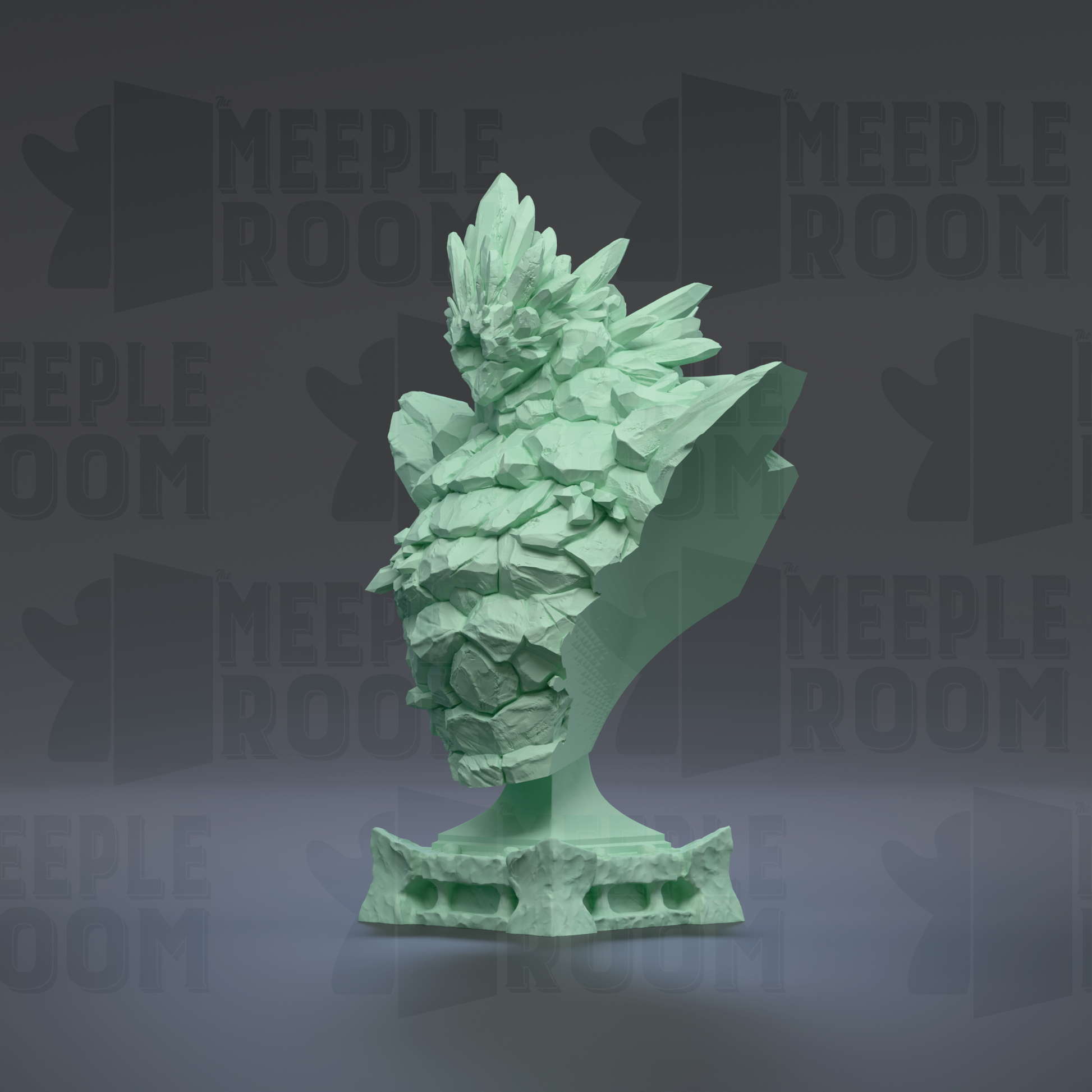 A green, sculpted bust of a mythical creature, possibly a dragon or serpent, with intricate details and textures.