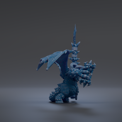 A 3D rendering of a blue dragon-like creature with sharp teeth and claws, standing on one leg and holding a weapon in its other hand.