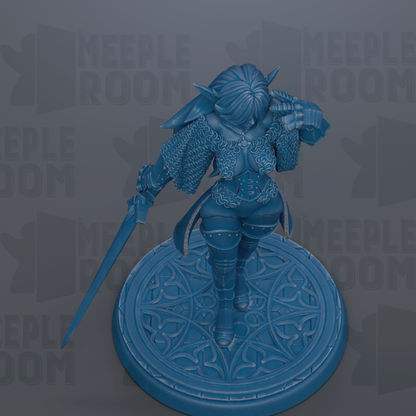 A blue figurine of a warrior standing on a circular base, holding a sword in one hand and a shield in the other.