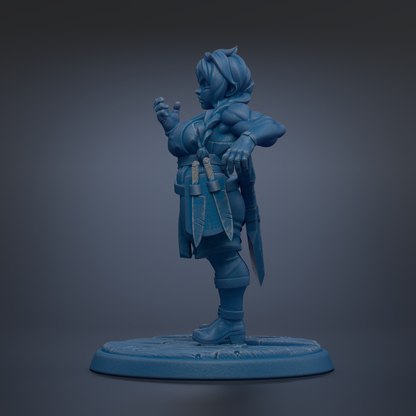 A blue figurine of a person standing on a platform, holding a weapon in their hand.