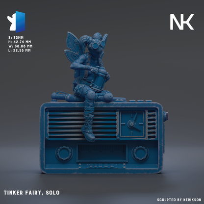 A blue fairy figurine is perched on top of a vintage-style radio set against a dark background.