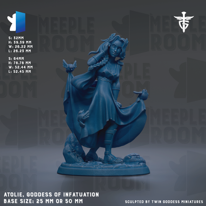 The image is a figurine of a woman with long hair, wearing a flowing dress, and holding a bird. The figurine is blue in color and appears to be made of a material that resembles metal or plastic. The image is described as a "meadow" and "meadow room" and is part of a collection of figurines. The base size of the figurine is either 25mm or 50mm. The image is described as "sculpted by twin goddess miniatures".
