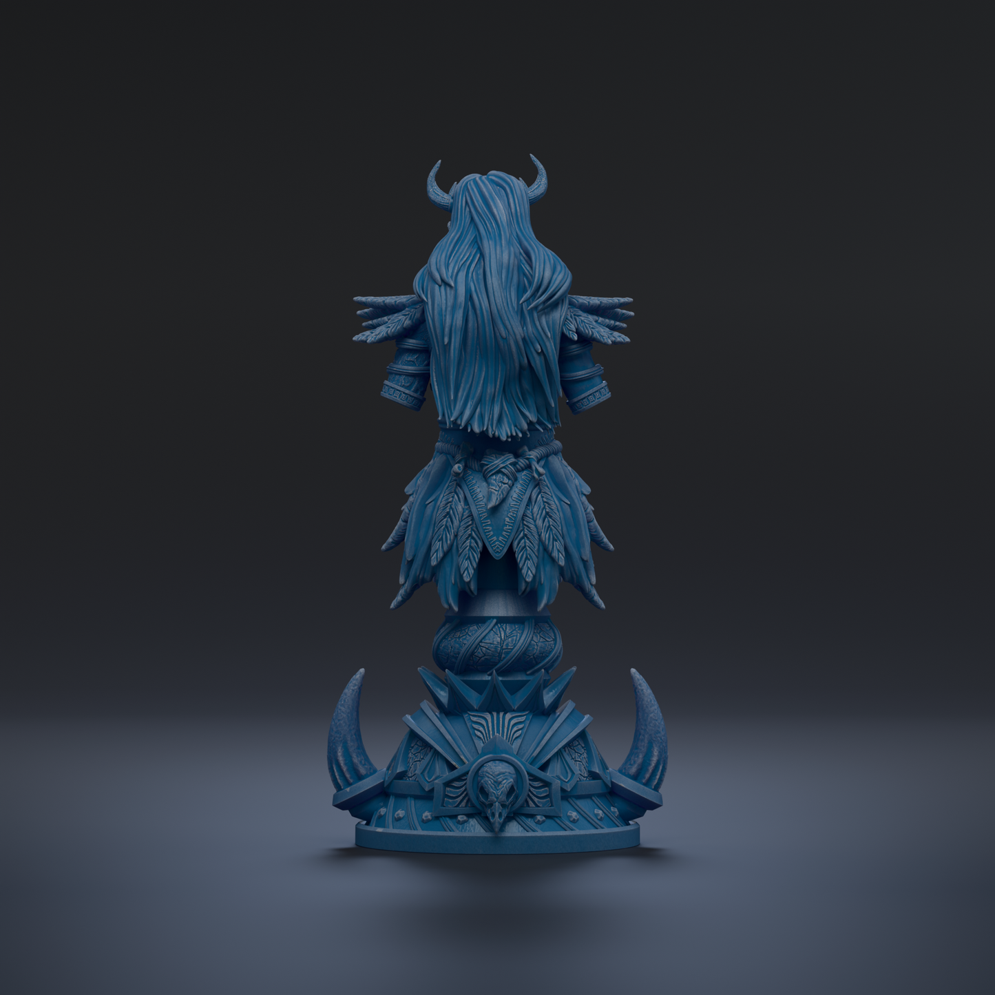 A blue statue of a woman with long hair and horns, standing on a pedestal with ornate designs.