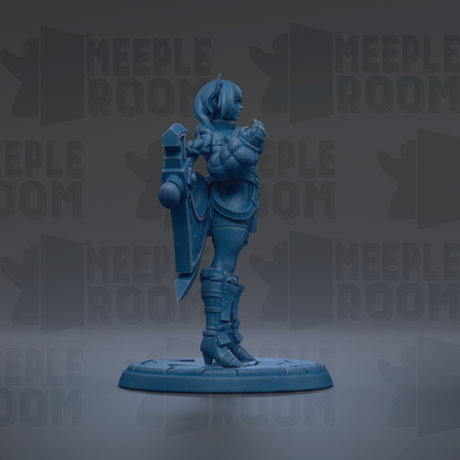 A blue figurine of a female character with a sword and shield stands on a platform against a dark background with repeated text.