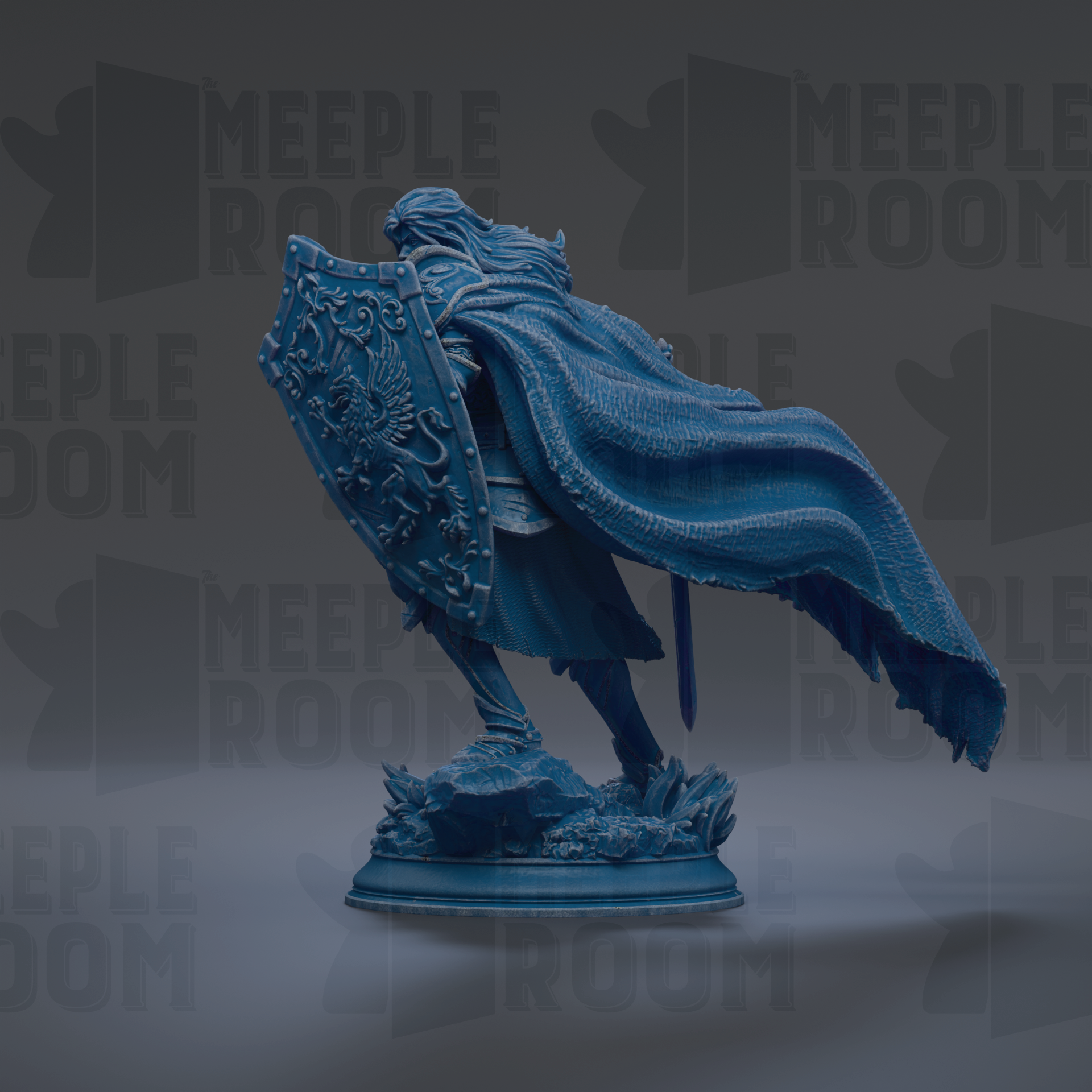 A blue statue of a person with a shield and flowing cape, standing on a base with rocks and plants.