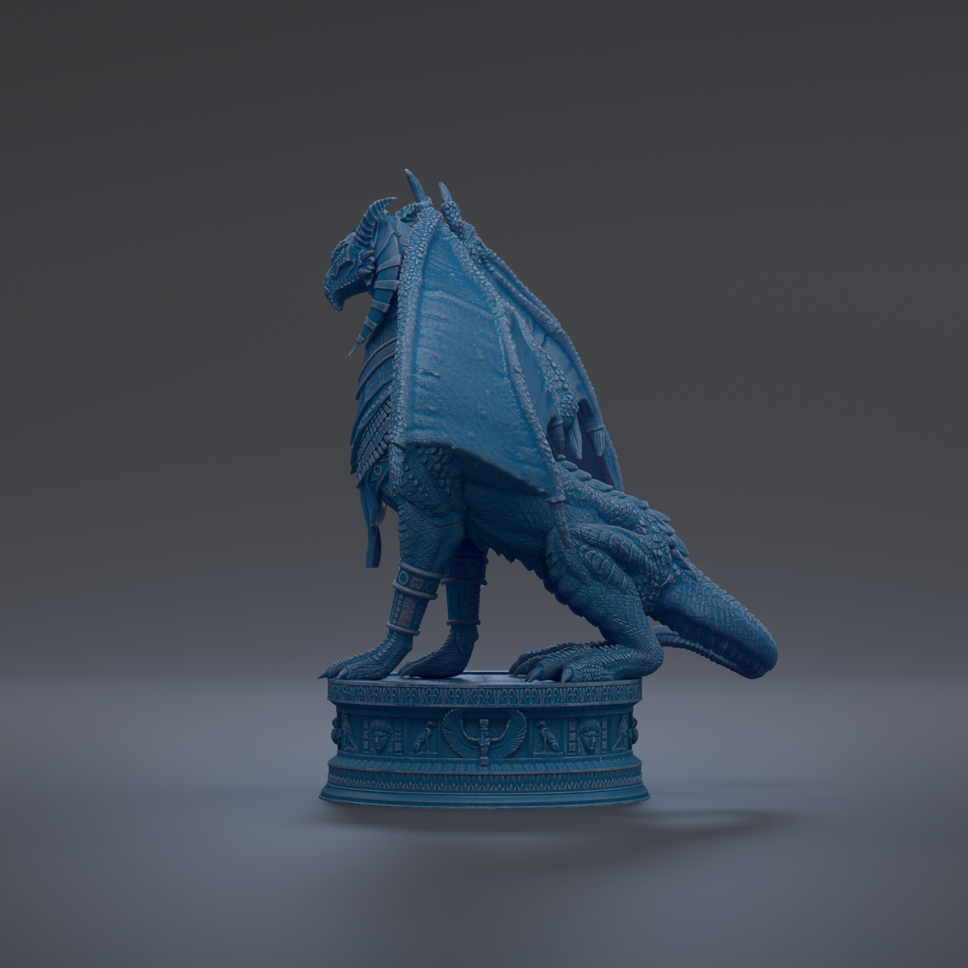 A blue dragon statue standing on a pedestal against a dark background.