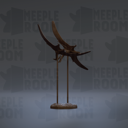 a dark brown sculpture of a bird perched on a stand.