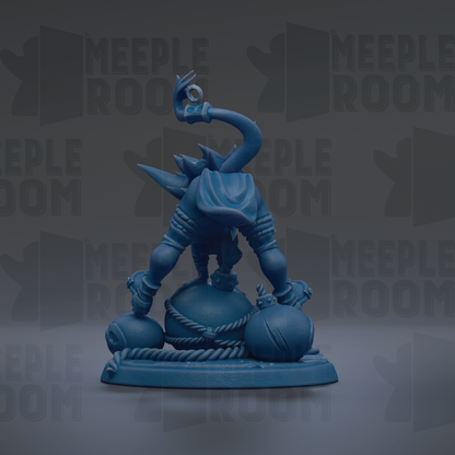A blue figurine of a character with a curved neck and a raised hand, standing on a base with other figurines.