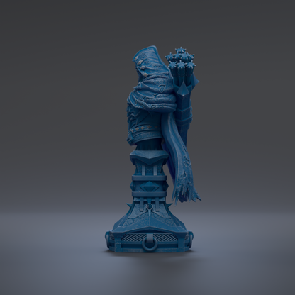 A blue statue of a figure standing on a pedestal against a dark background.
