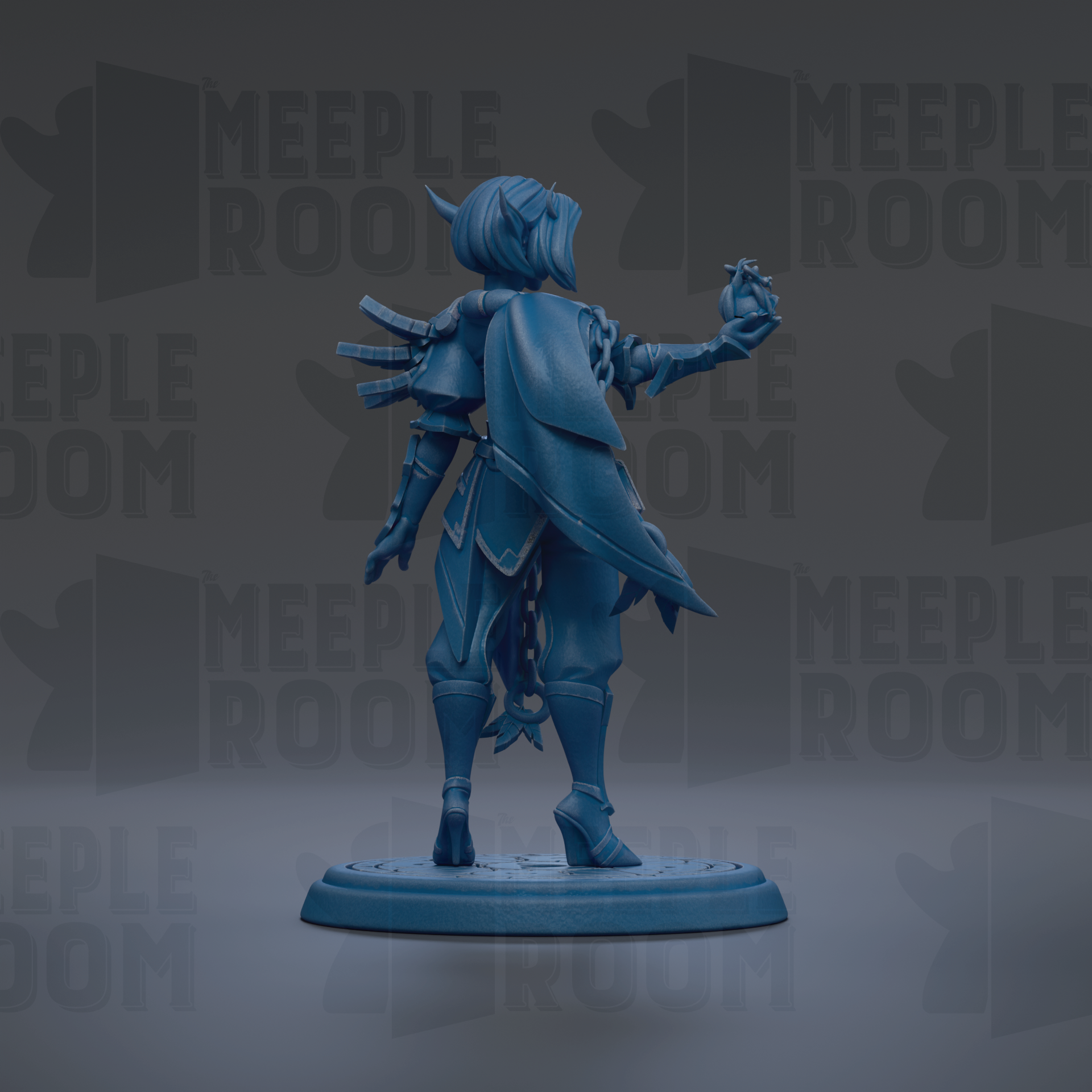 A blue figurine of a character with a pointed hat and a cape, standing on a platform and holding a small object in their hand.