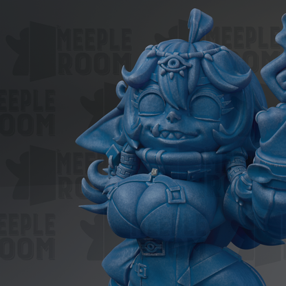 A close-up of a blue, cartoonish figurine with exaggerated features, such as large eyes, horns, and a prominent nose.