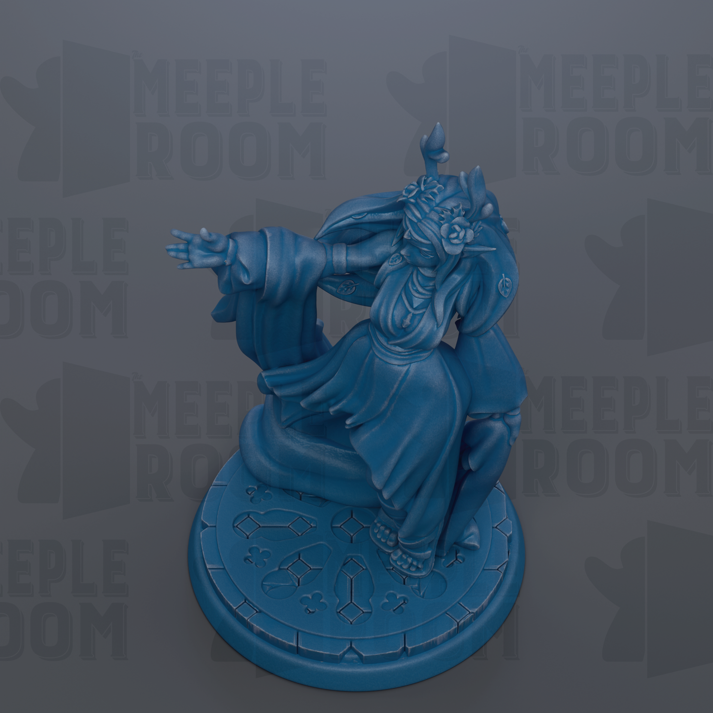 A blue figurine of a person with outstretched arms, standing on a circular base with a patterned design.