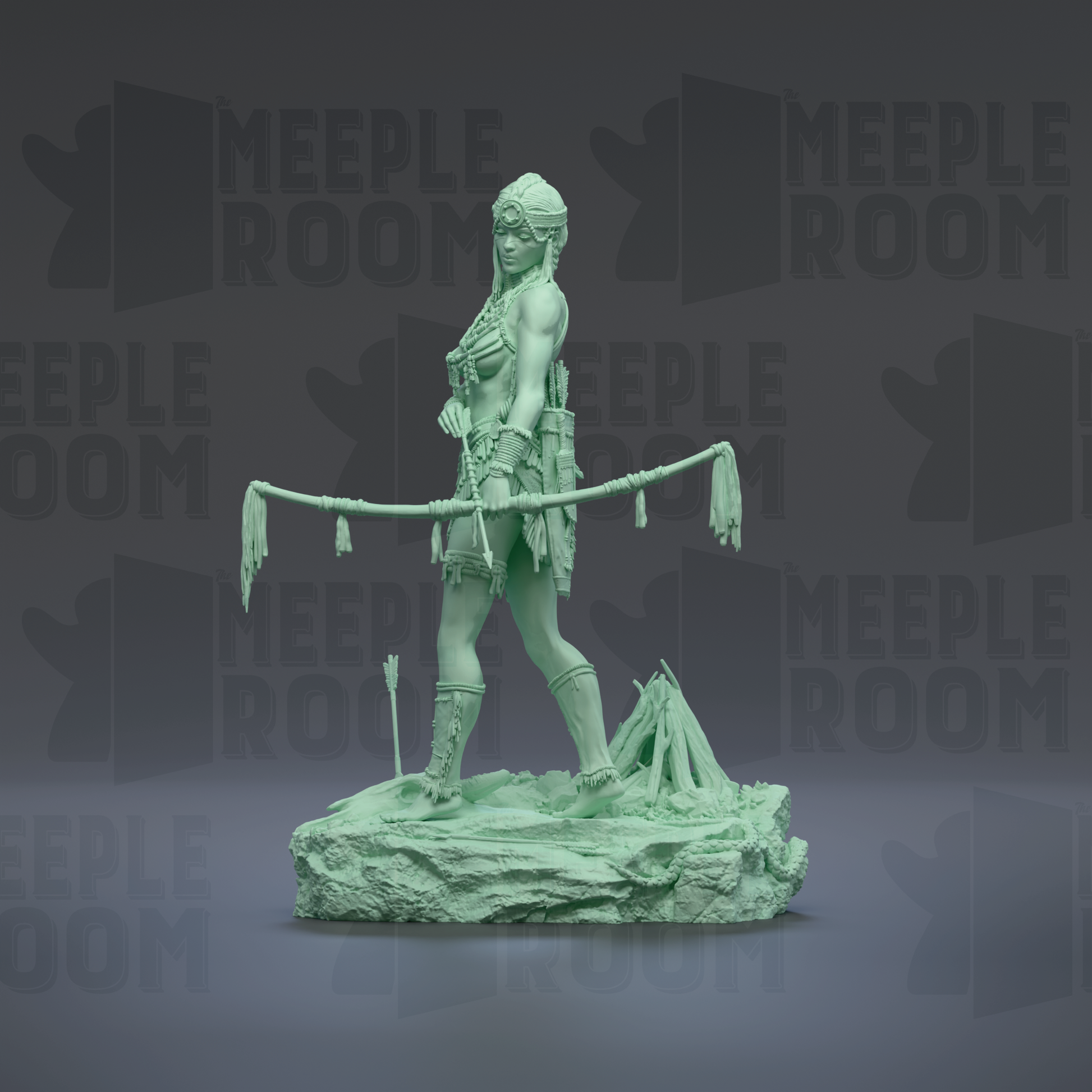 A green statue of a woman holding a spear and standing on a rock.