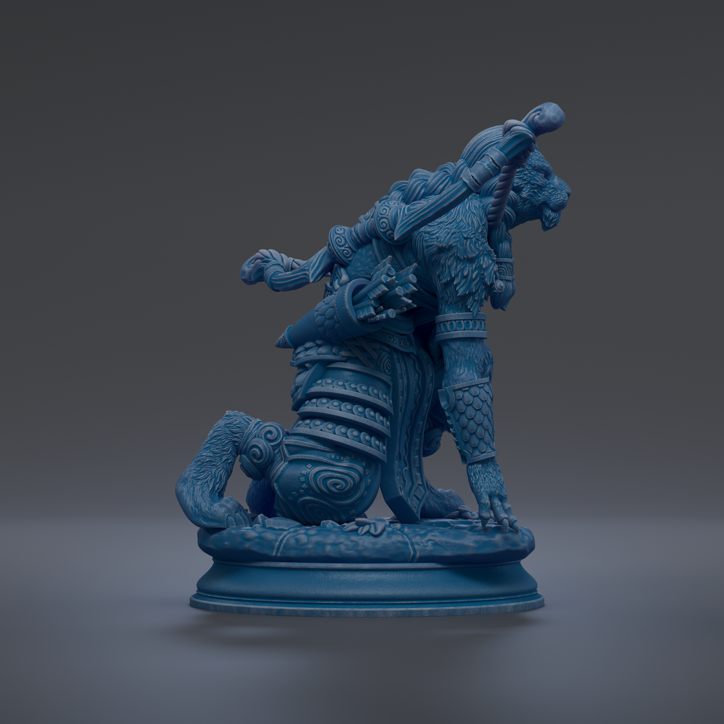 A blue statue of a fierce-looking creature with intricate details and a fierce expression, standing on a pedestal.