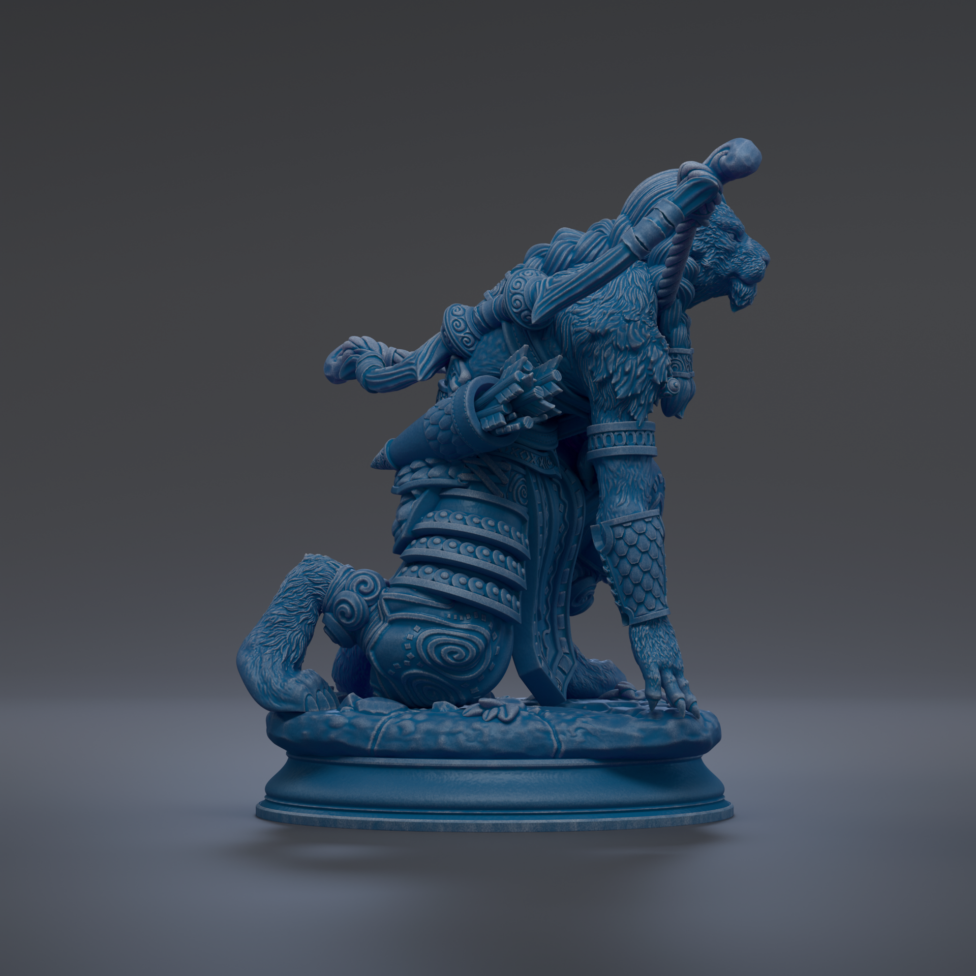 A blue statue of a fierce-looking creature with intricate details and a fierce expression, standing on a pedestal.