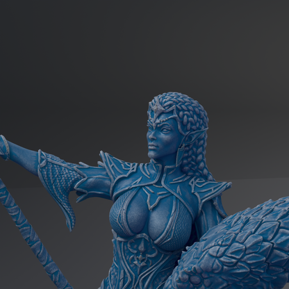 A blue, detailed statue of a female warrior figure with intricate armor and a fierce expression.