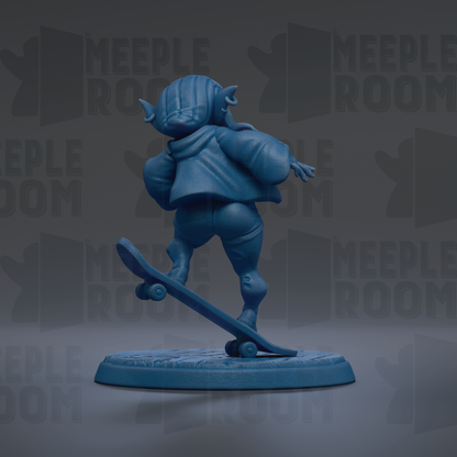 A blue figurine of a skateboarder is depicted in the image.
