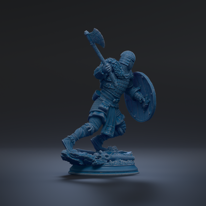 A blue armored warrior figure wielding a shield and sword stands on a base against a dark background.