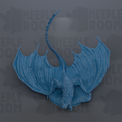 A blue dragon figurine with outstretched wings is the central focus of the image.