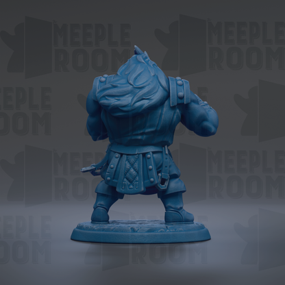 A blue figurine of a muscular, armored character with a large head and a backpack, standing on a base.