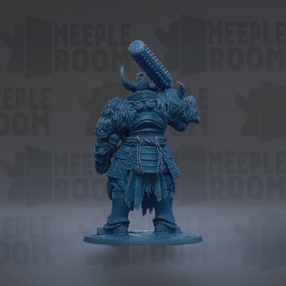A blue figurine of a warrior standing in a fighting stance, with a large weapon on its back.