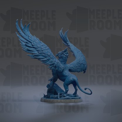 A blue statue of a winged creature with a fierce expression, standing on a pedestal.