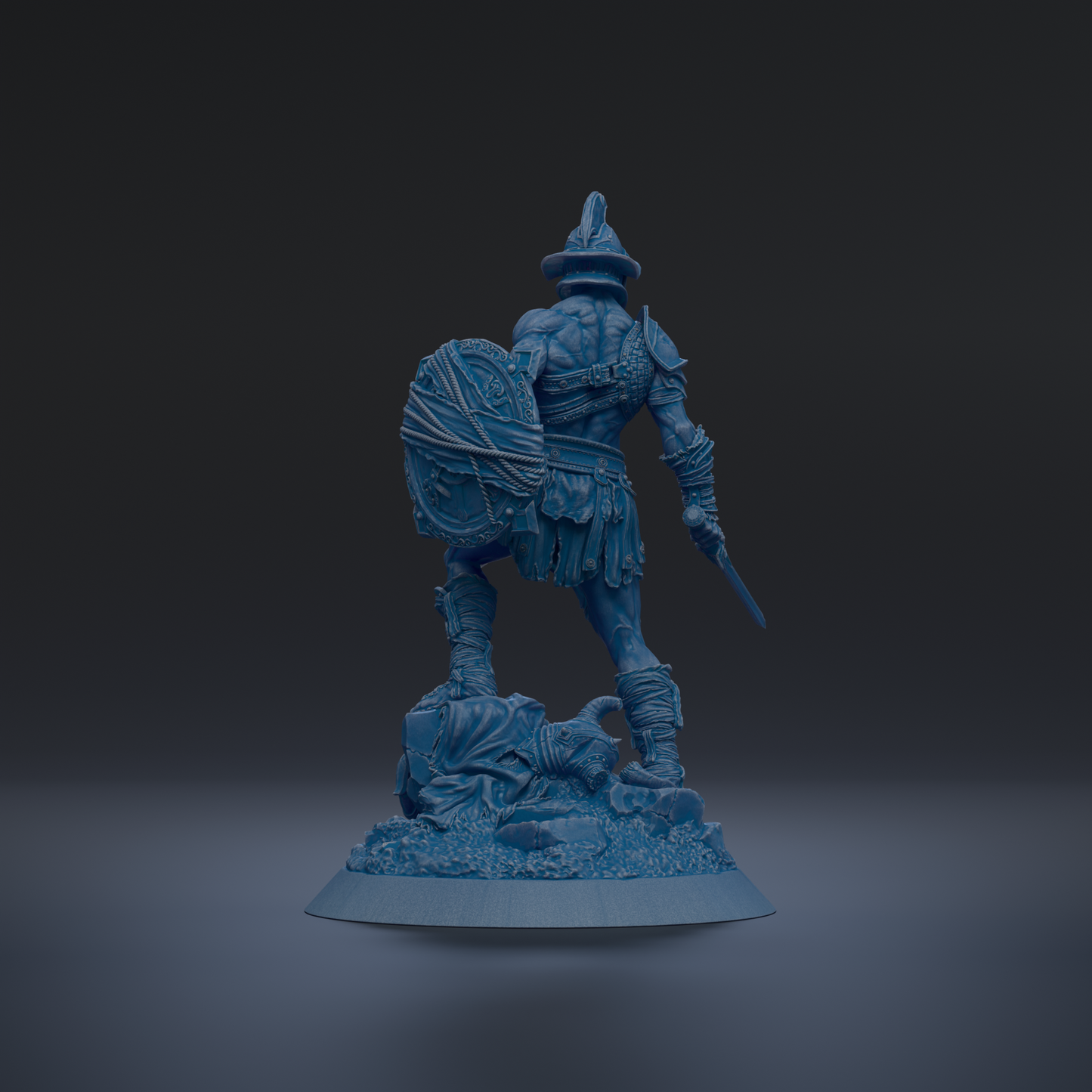 A blue statue of a warrior standing on a rocky base, holding a shield and sword.