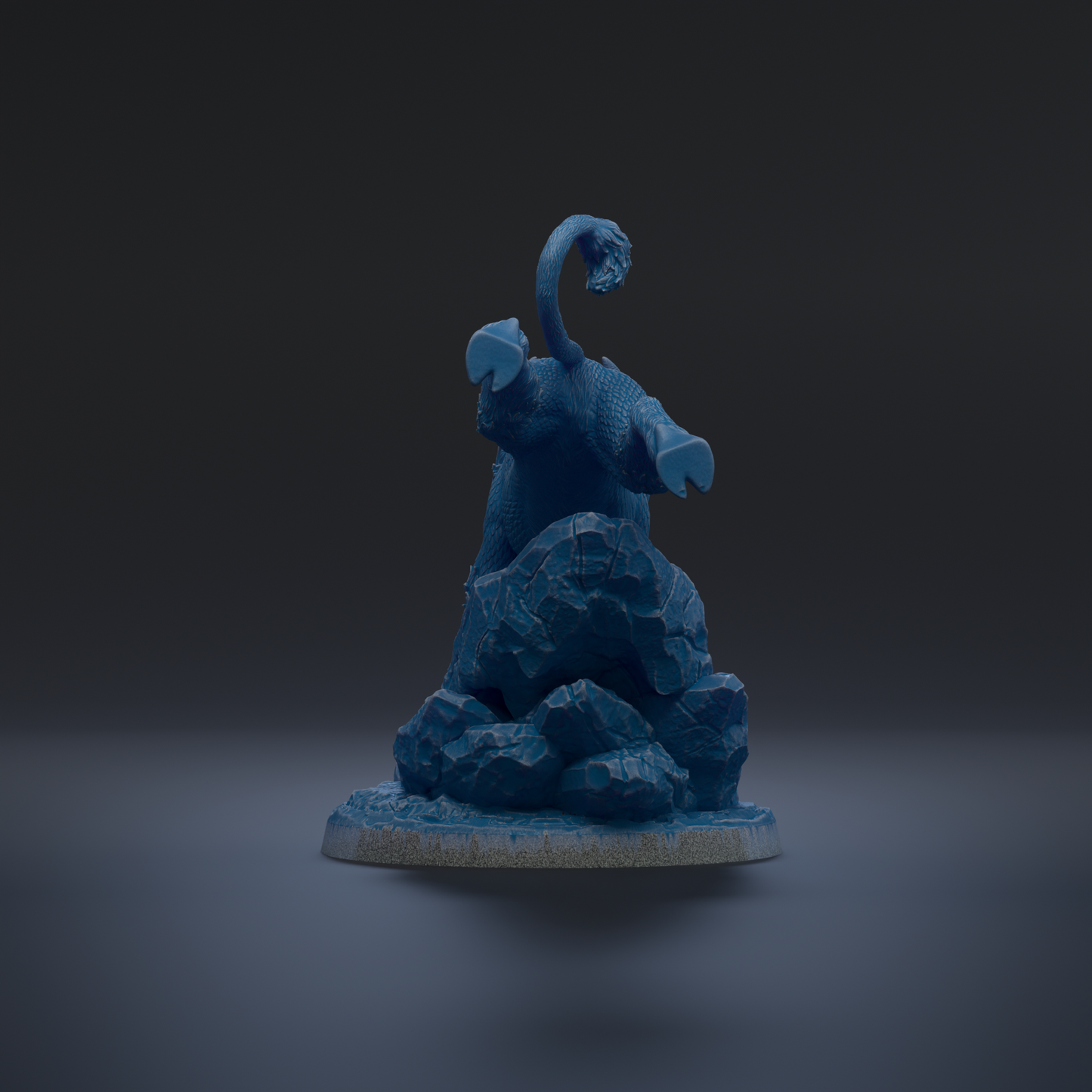 A blue, 3D-rendered statue of a dragon-like creature sitting atop a pile of rocks against a dark background.