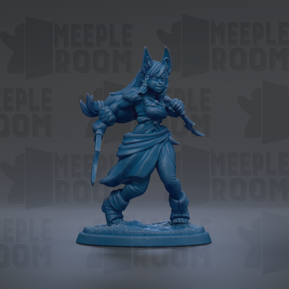 A blue figurine of a female character with long hair and a flowing skirt, holding a sword and shield, standing on a base.