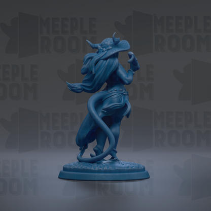 A blue figurine of a woman with horns and a flowing skirt, standing on a base and facing away from the camera.