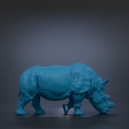 A blue rhinoceros statue is shown against a dark background.