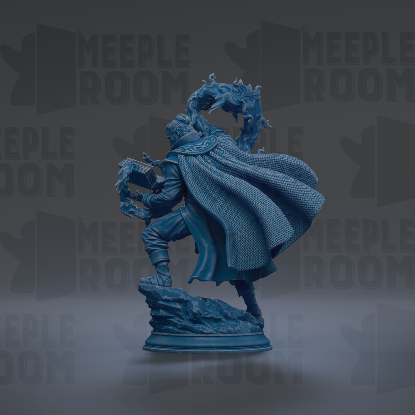 A blue statue of a person with a flowing cape, standing on a rock and holding a book.