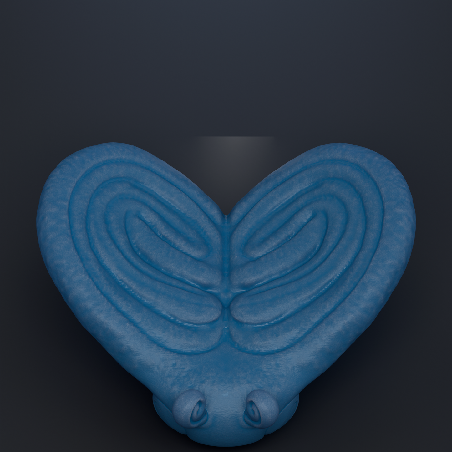 A blue heart-shaped object with a spiral pattern on it, set against a dark background.