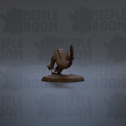 a brown statue of a bird, possibly a turkey, sitting on a wooden base.