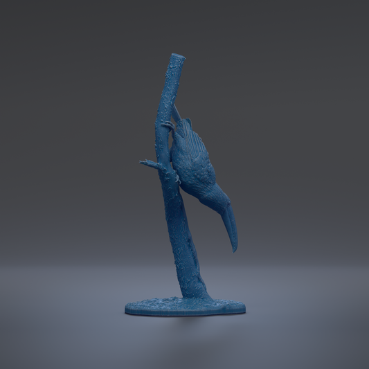 A blue bird figurine perched on a branch against a dark background.